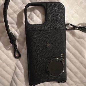 Brand new bandolier case for iPhone 12. Used for a week and got a new phone.